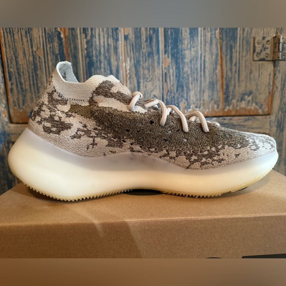 Adidas Mens Yeezy Boost 380 sneakers in Pyrite color.